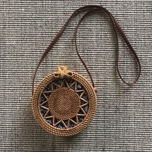 New cane crossbody bag with blue floral lining